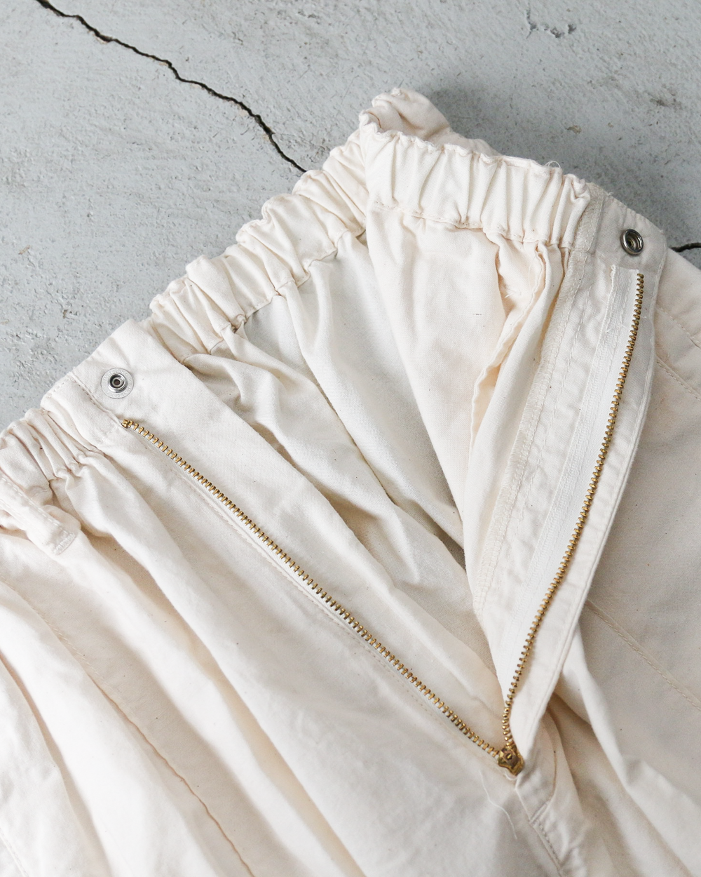 NECESSARY or UNNECESSARY NOUN PIN TUCK EASY PANTS Natural