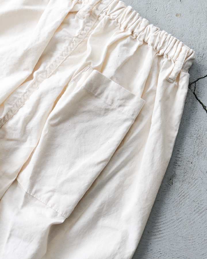 NECESSARY or UNNECESSARY NOUN PIN TUCK EASY PANTS Natural