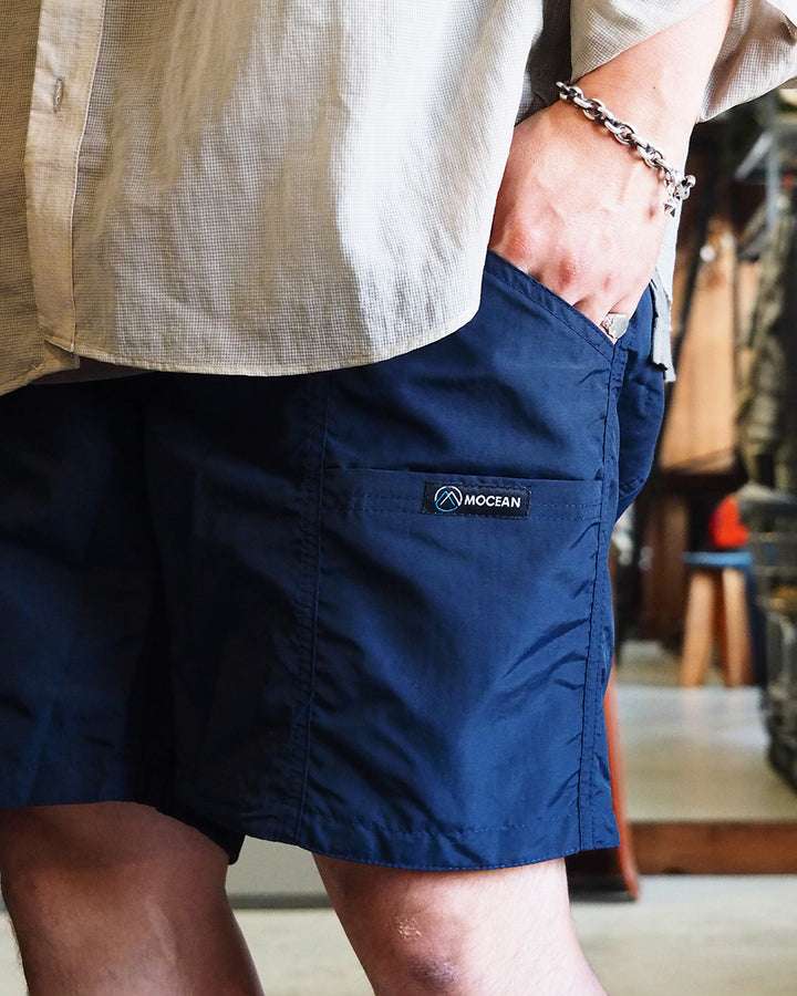 MOCEAN モーシャン Velocity Shorts Dark Navy